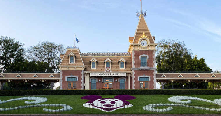Disneyland Railroad station at main entrance to Disneyland Park on sunny day.