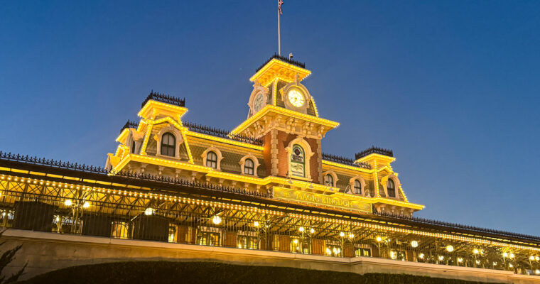 Magic Kingdom entrance Walt Disney World Railroad station at nighttime.