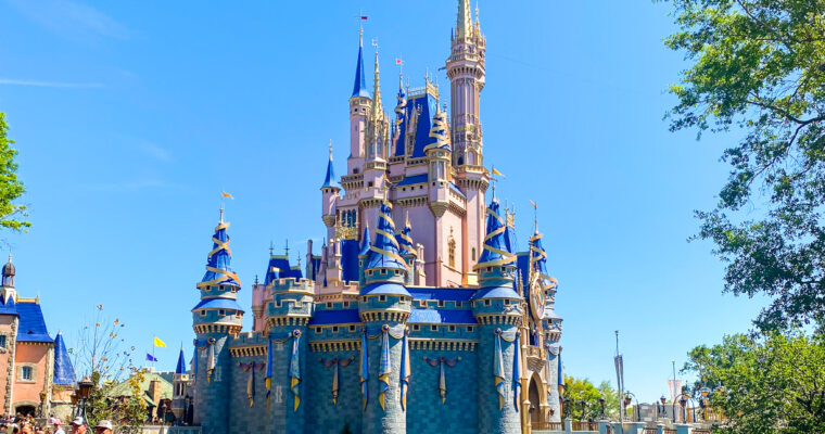 Cinderella Castle at Magic Kingdom in Walt Disney World on clear, sunny day.